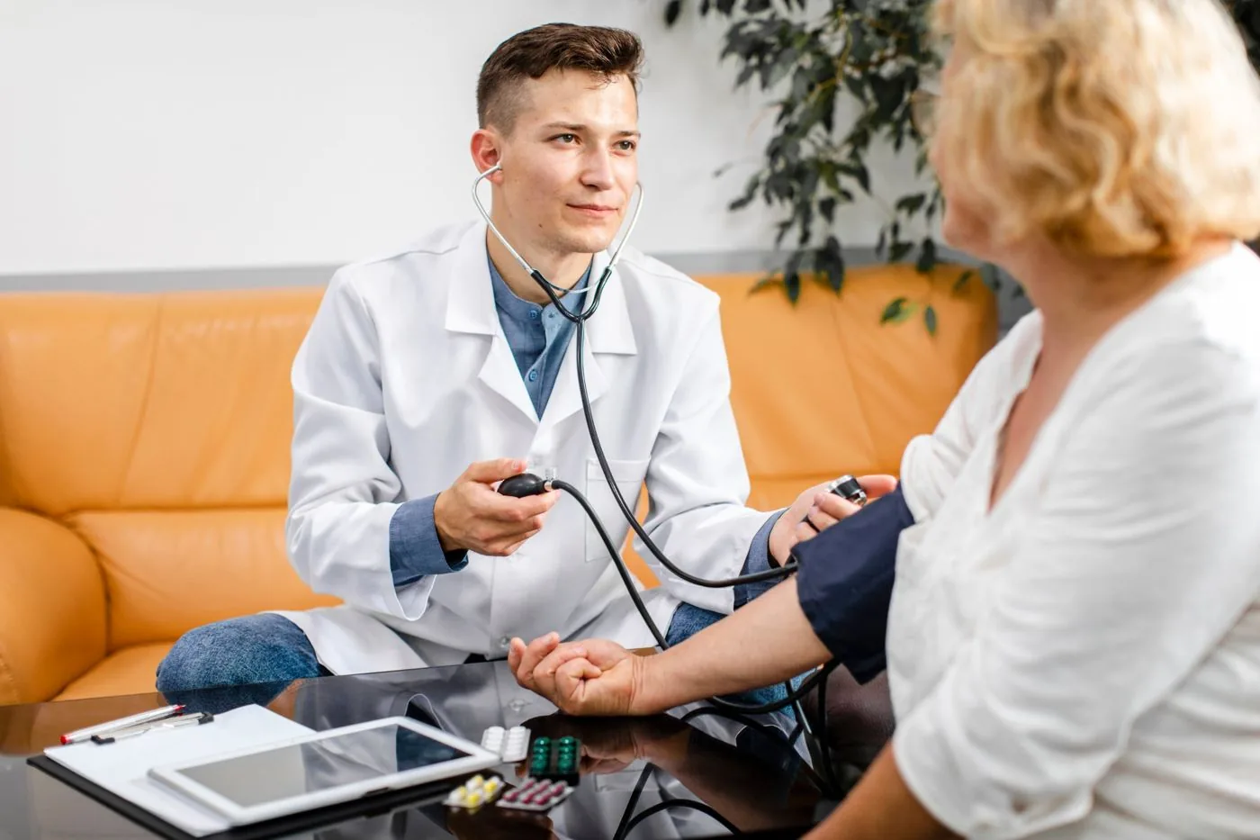Doctor measuring a patient’s blood pressure
